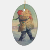 Weihnachten, Kind mit großem Paket Keramikornament (Links)