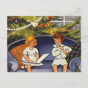 Weihnachten, Kinder auf einer Couch sitzen Feiertagspostkarte