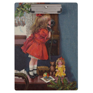 Weihnachten kleines Mädchen Telefon Antiquität Klemmbrett