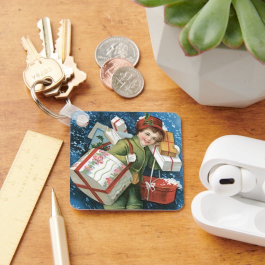 Weihnachten, Mädchen mit Geschenken im Winter Schn Schlüsselanhänger (Schreibtisch)