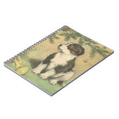 Weihnachten, Niedlicher Welpe unter Weihnachtsbaum Notizblock (Linke Seite)