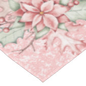 Weihnachten Poinsettias auf einem rosa Glitzer Hin Tischdecke (Schrägansicht)