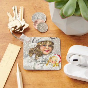 Weihnachten Viktorianisches Mädchen mit Puppe im S Schlüsselanhänger