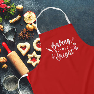 Weihnachtlich rote Backzutaten bringen helle Weihn Schürze