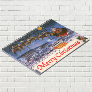 Weihnachtlicher Santa Claus beim Fliegen seines Sc Notizblock