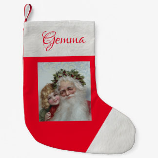 Weihnachtlicher Santa und kleines Mädchen Kleiner Weihnachtsstrumpf