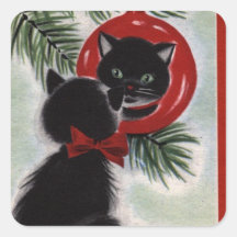 Weihnachtlicher Schwarzer Katze beim Betrachten ei