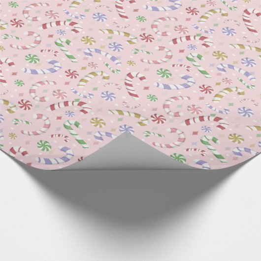 Weihnachts-Candy Canes auf Rosa Geschenkpapier (Ecke)