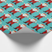 Weihnachts-Cartoon-Grinning im Weihnachtsmann Geschenkpapier (Ecke)