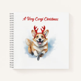 Weihnachts-Corgi mit Rentier-Antlers springen Notizblock