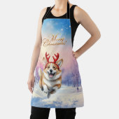 Weihnachts-Corgi-Rentierfischer springen im Schnee Schürze (InSitu)