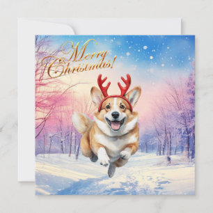 Weihnachts-Corgi-Rentiergeweih springt im Schnee Feiertagskarte
