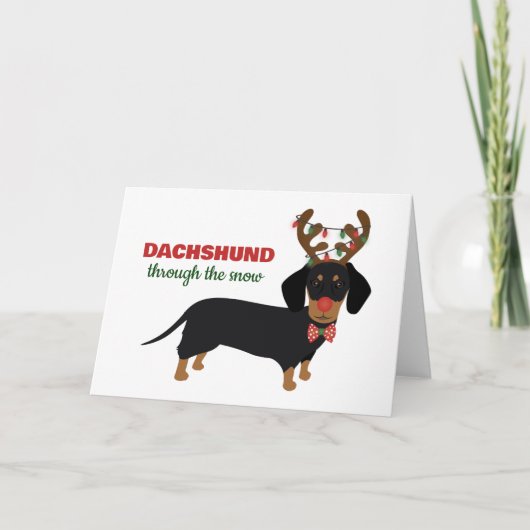 Weihnachts-Dackel durch den Schneekneehund Karte (Vorderseite)