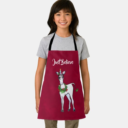 Weihnachts-Einhorn, glauben Sie nur Schürze (Insitu)