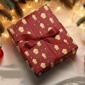 Weihnachts-Haus Gingerbrett auf dunkelrotem Hinter Geschenkpapier
