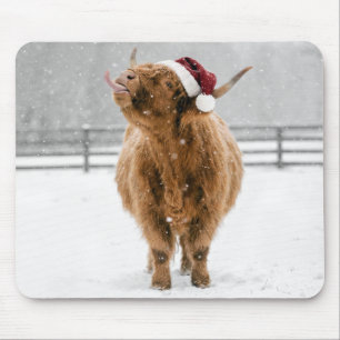 Weihnachts Highland-Kuh leckt Schneeflocken Mousepad