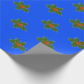 Weihnachts-Holly-Dekorationsmuster auf blau Geschenkpapier (Ecke)