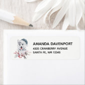 Weihnachts-Husky-Hund in einer Weihnachtsmannmütze (Insitu)