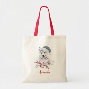 Weihnachts-Husky-Hund in einer Weihnachtsmannmütze Tragetasche