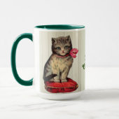 Weihnachts-Kitten mit einem roten Bow Tasse (Links)