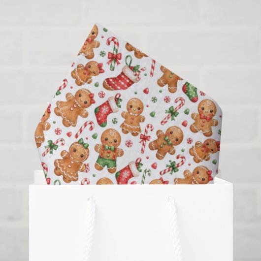 Weihnachts-Lebkuchenjunge und -Mädchen mit Strümpf Seidenpapier (Geschenktüte)
