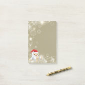 Weihnachts-Monster-Puppe mit roter Weihnachtsmannm Post-it Klebezettel (Auf Schreibtisch)