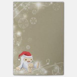 Weihnachts-Monster-Puppe mit roter Weihnachtsmannm Post-it Klebezettel
