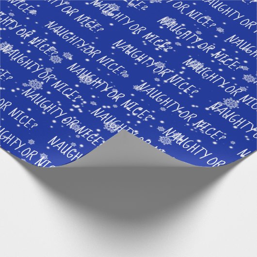 Weihnachts-NAUGHTY- ODER NICE-Text auf blau Geschenkpapier (Ecke)