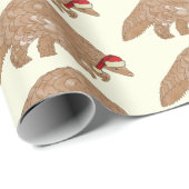 Weihnachts-Pangolin Eine Weihnachtsmannmütze trage Geschenkpapier (Rolleneckpunkt)
