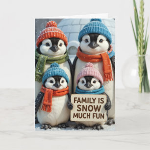 Weihnachts-Penguin-Familie in Schneeflocken Karte