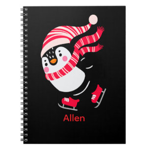 Weihnachts-Penguin in einem Hut und Scarf auf Skat Notizblock