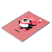 Weihnachts-Penguin in einem Hut und Scarf auf Skat Notizblock (Linke Seite)