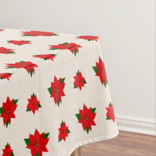 Weihnachts-Poinsettia-Blume auf Light Beige Tischdecke
