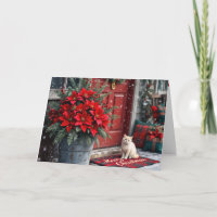 Weihnachts-Poinsettien und weiße Katze auf Fußmatt