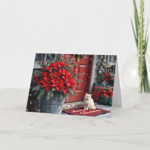 Weihnachts-Poinsettien und weiße Katze auf Fußmatt Feiertagskarte