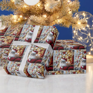 Weihnachts-Ragdoll-Katze auf einem roten antiken S Geschenkpapier