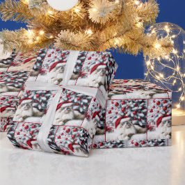Weihnachts-Ragdoll-Katze In einer Weihnachtsmannmü Geschenkpapier