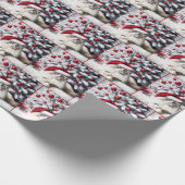 Weihnachts-Ragdoll-Katze In einer Weihnachtsmannmü Geschenkpapier (Ecke)