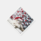 Weihnachts-Ragdoll-Katze In einer Weihnachtsmannmü Serviette (Ecke)