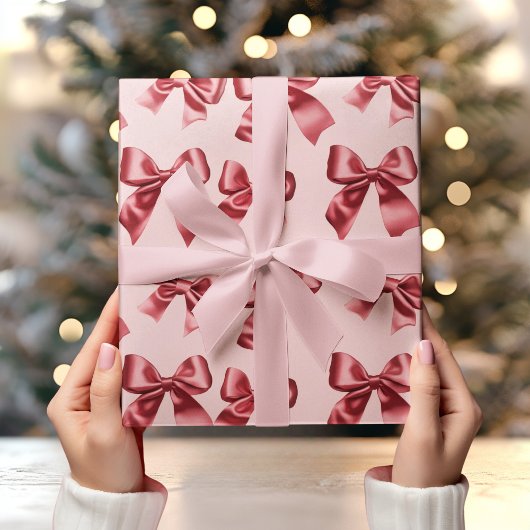 Weihnachts Red Bow auf rosa Hintergrund Geschenkpapier
