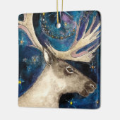 Weihnachts-Rentier am Abend mit einem Shining-Star Keramikornament (Links)