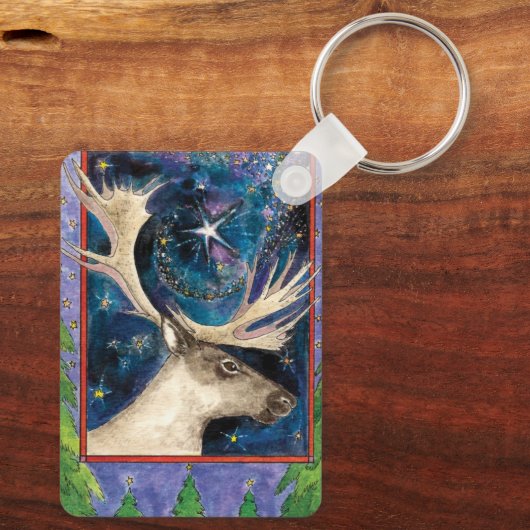 Weihnachts-Rentier am Abend mit einem Shining-Star Schlüsselanhänger (Rückseite)