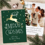 Weihnachts-Rentier Custom Foto Forest Green Gold Folien Feiertagskarte<br><div class="desc">Elegante Weihnachtskarten aus Gold im Art-Déco-Stil und Ihr eigenes personalisiertes Foto auf der Rückseite. Dieses bearbeitbare Template verfügt über einen Rentier mit festlichen Blätter, Beeren und Sternen. Eine stilvolle Farbpalette aus blauem Waldgrün, weißen und echten Folienelementen in Gold, Silber oder Rose. Der Text kann mit Namen, Datum und persönlichem Gruß...</div>