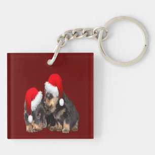 Weihnachts-Rottweiler mit festlichen Feiertagsmütz Schlüsselanhänger