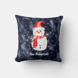 Weihnachts-Schneemann auf dunkelblauem Schneeunter Kissen