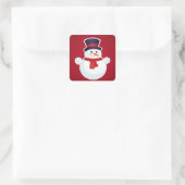 Weihnachts-Schneemann im roten Hintergrund Quadratischer Aufkleber (Tasche)
