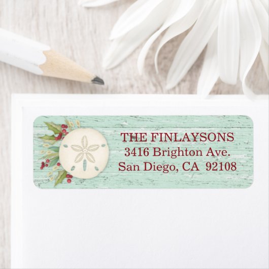 Weihnachts-Strandadresse-Label an der Küste (Insitu)