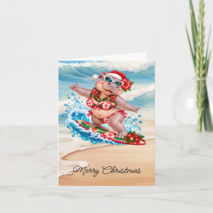 Weihnachts-Surfing-Flusspferd-Bikini auf Surfbrett Feiertagskarte