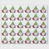 Weihnachts-Wrapping Paper wird mit einem Geschenk  Geschenkpapier (Flach)