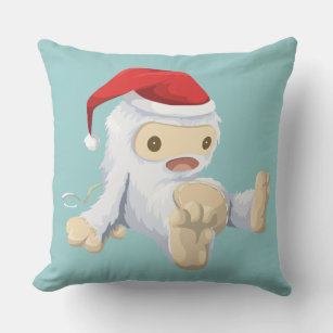 Weihnachts-Yeti-Puppe Eine Weihnachtsmannmütze tra Kissen